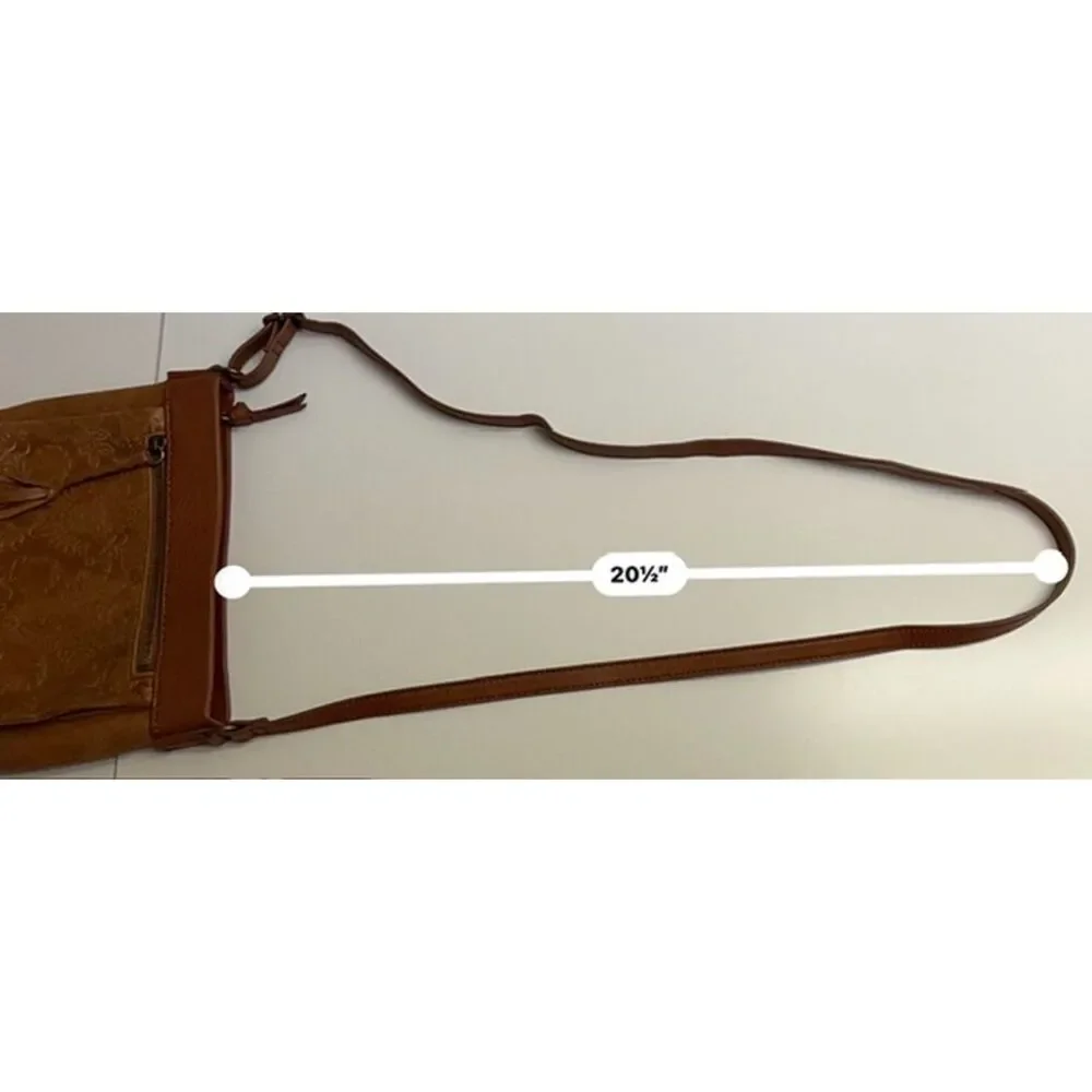 The Sak matte floral embossed tan leather Sanibel crossbody bag
